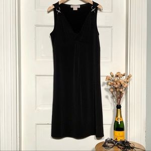 Michael Kors. Black dress is cute and sensual at anytime.